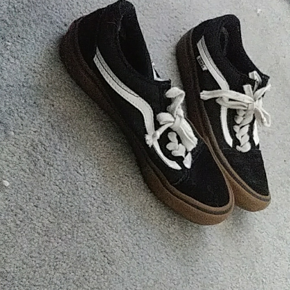 Black vans with brown lining